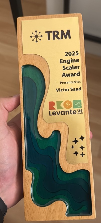 The 2025 Engine Scaler Award: a wooden plaque with a green resin inlay, engraved "TRM — 2025 Engine Scaler Award, Presented to: Victor Saad, RKO Levante '26 Spain".